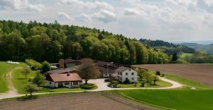 an aerial view of a house and a field at Ferienwohnung Aichem in Radolfzell am Bodensee