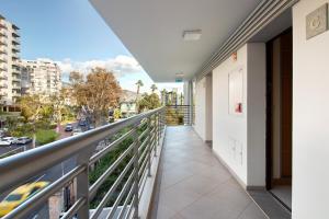 a balcony with a view of a city at Dfm Happy Days C - Funchal in Funchal