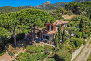 an aerial view of a house with trees at Villa Les Ombrelles in Portoferraio +45 photos