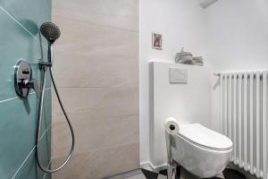 a bathroom with a shower with a toilet in it at Casa romantica in Ispra +22 photos