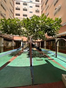 Foto de la galeria de Stylish Condo Near Mall with Pool & Netflix a Biñan