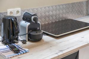 a coffee maker sitting on top of a counter at L' Eclose Ty Du in Le Guilvinec