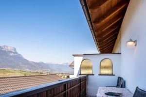 a balcony with a view of the mountains at Valtlhof - Apt 1 in Cornaiano
