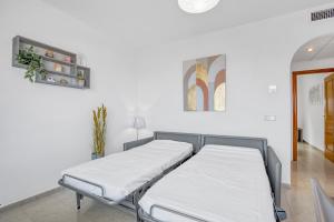 a hospital room with three beds in it at Clementina Imperial Park in Calpe +18 photos