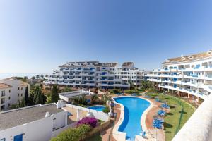 an aerial view of a resort with a swimming pool at La Terraza del Mar in Manilva