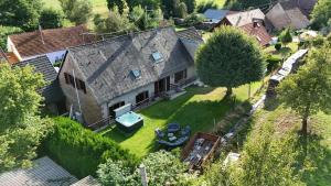 an aerial view of a house with a yard at La Buissonnière in Erckartswiller