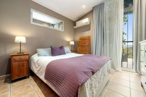a bedroom with a bed and a window at Valle de los sueños in Canyelles +22 photos