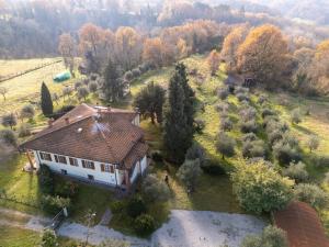 an aerial view of a house in a field at Poggio Loccano in Montevarchi