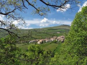 a view of a village in the hills at Il Focolare dei Sibillini in Visso