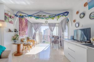 a living room with a view of a city at Moby Dick in Benidorm