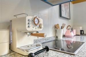 a kitchen with a mixer on a counter at La Bonita de Pego in Pego +21 photos