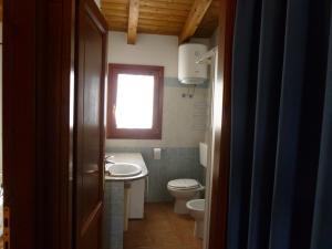 Kúpeľňa v ubytovaní Le Villette di San Teodoro