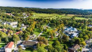 an aerial view of a campus with trees and buildings at Ferienwohnung Sieglinde in Bad Dürrheim