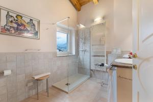a bathroom with a shower and a sink at Il Nido Aosta in Aosta +24 photos