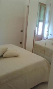 Letto o letti in una camera di Portico dei Sassi