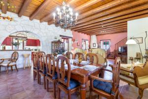 a dining room with a table and chairs at Villa Ira in Agios Leon