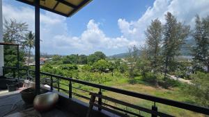 a view from the balcony of a house at joyful the Kris406 in Ban Lum Fuang