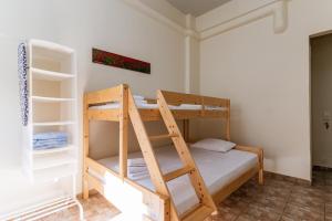 a bedroom with two bunk beds in a room at En Tino Basement 5 in Tinos