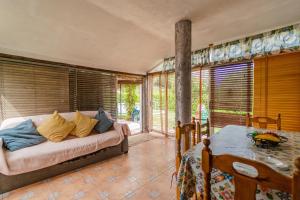 a living room with a couch and a table at Maitemare in Traspinedo