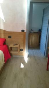 Postel nebo postele na pokoji v ubytování Camera Fenis + 9 fotografií
