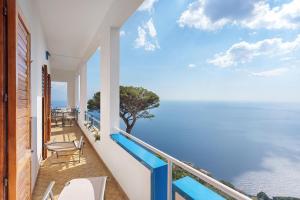 a balcony with a view of the ocean at Le Terrazze Di Serafina in Furore
