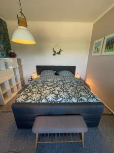 a bedroom with a large bed in a room at am Conradhof in Goch