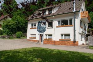 a building with a mural on the side of it at Haus Strohmeier in Brandenberg