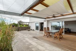 an outdoor patio with a table and chairs at Haus Elisabeth in Lauf