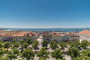 a view of a city with trees and buildings at Setúbal Dreams in Setúbal