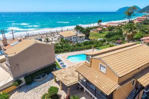 an aerial view of a house and the beach at Mires House Side Ground Floor 4 in Agios Gordios