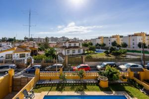 a view of a parking lot from the balcony of a house at Milestone House in Rincón de la Victoria