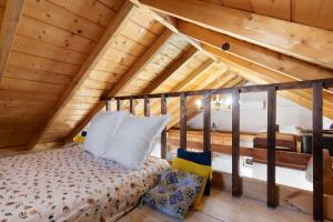a bedroom with a bed in a attic at Media Pipa in Puntagorda +23 photos
