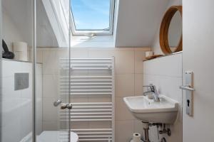 a bathroom with a shower and a sink at Gallushof in Lauterbach +75 photos