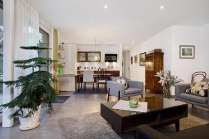a living room with a couch and a table at Kapps Haus in Langenargen