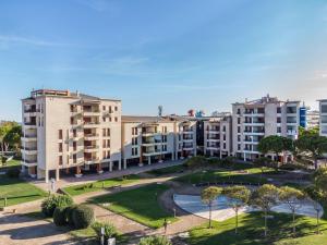 an aerial view of buildings in a city at La terrazza sul faro in Lignano Sabbiadoro