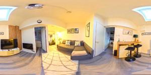 a large living room with a bed and a desk at Apartment in cite center in Manchester