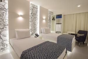 Giường trong phòng chung tại ibis Styles Rio de Janeiro Botafogo