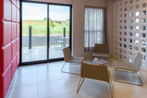 Χώρος καθιστικού στο ibis Styles Birigui