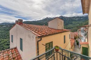 a view from a balcony of a building at Nadine - Bilocale In Centro in Marciana
