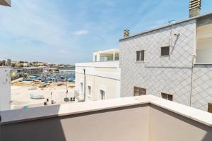 a view from the balcony of a building with a parking lot at Suite N12 - Luxury Apartment in Bari
