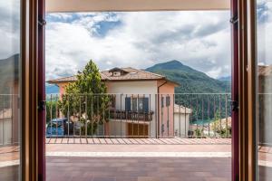 a view of a building from a window at Casa Weekend in Revò