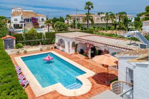 an aerial view of a house with a swimming pool at El Horreo Xabia in El Tosalet