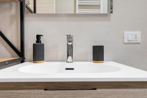 a sink with a faucet in a bathroom at A Casa Mia Prada vacanza di relax in Prada +21 photos