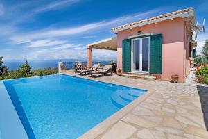 an image of a villa with a swimming pool at Villa Belvedere Rosa in Lefkada