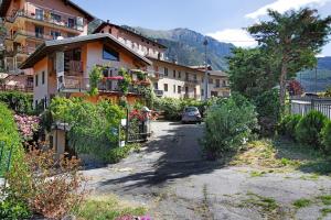 a car is parked in front of a building at Maison Chateau Chatillon in Châtillon