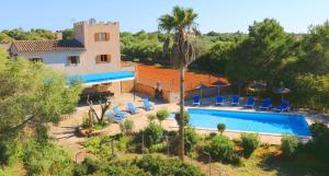an aerial view of a house with a swimming pool at Can Palea in Campos