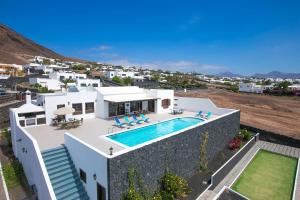 an aerial view of a villa with a swimming pool at Casa Paula in Yaiza