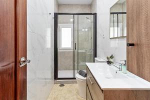 a bathroom with a shower and a toilet and a sink at Apartamento Centro de Marbella in Marbella +15 photos