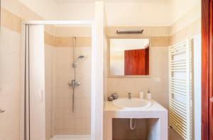 a bathroom with a sink and a shower at Casa Manuela in Lecce +20 photos