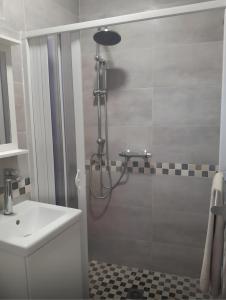 a bathroom with a shower and a sink at Casa cerca de Marbella in Ojén